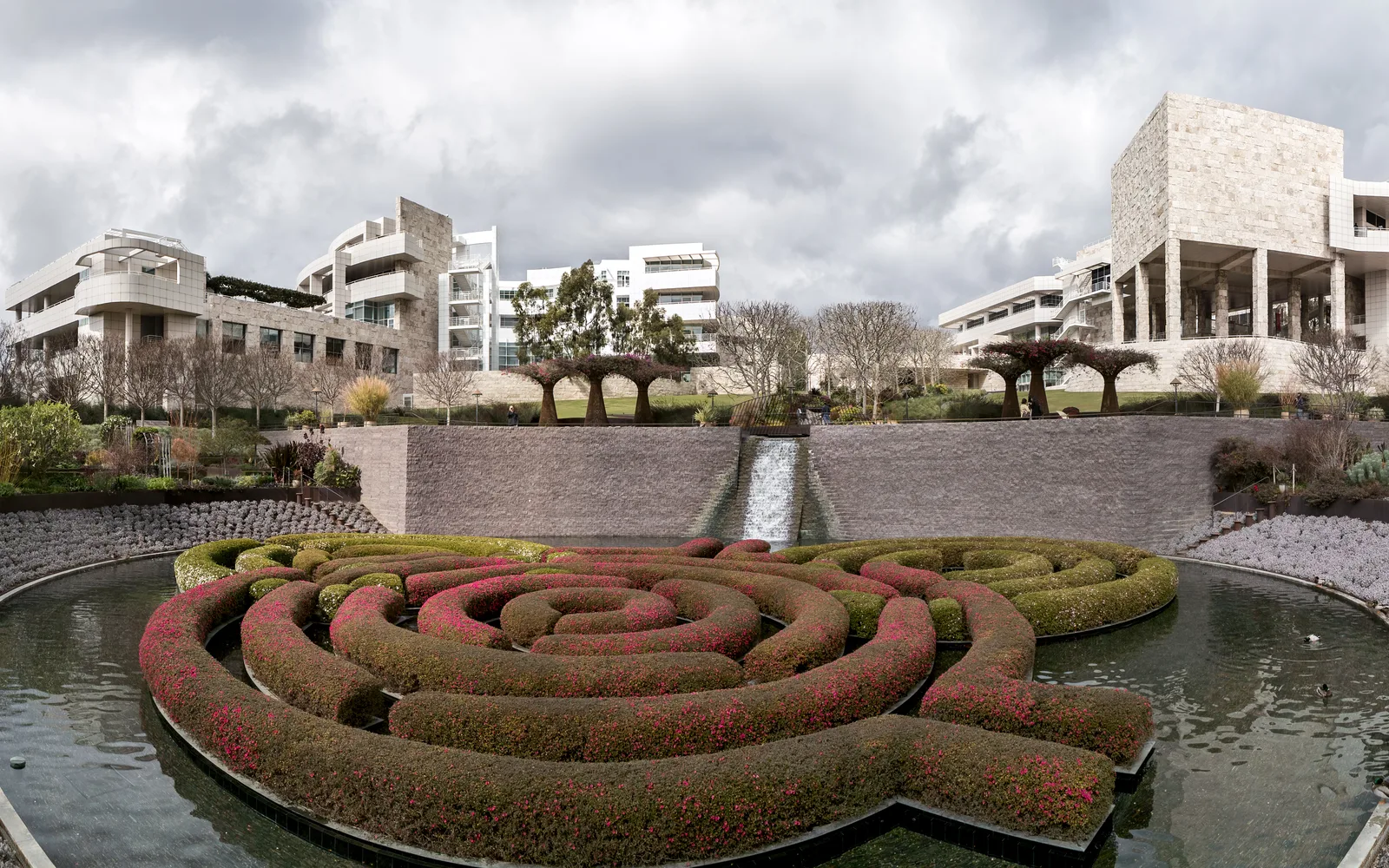 The Getty Center’s Central Garden azalea maze and stream with the museum pavilions behind